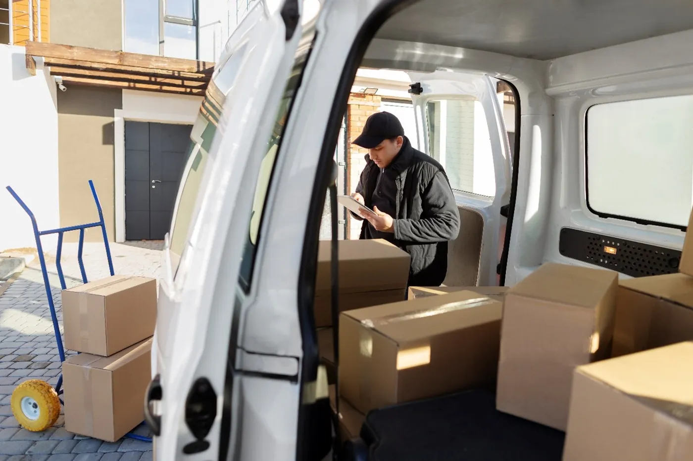 Motion Transport crew loading a customer's boxes outside their home