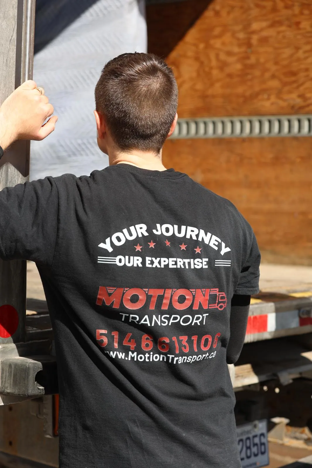 Motion Transport movers carrying furniture to the truck